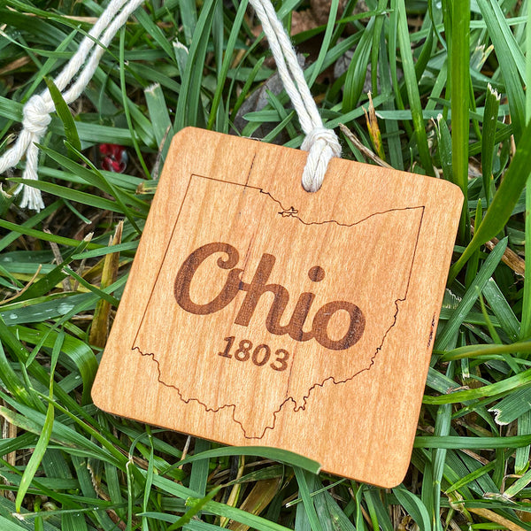 Ohio 1803 wood ornament  on grass