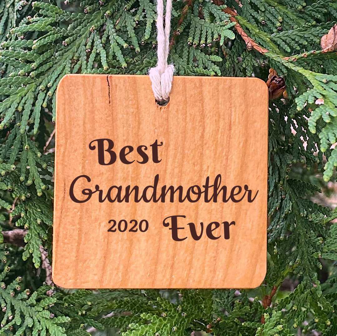 Best Grandfather Ever on pine tree background.