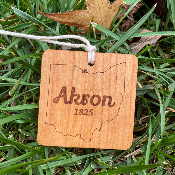 Wood Ornament laser engraved text Akron 1825 state of ohio outline.