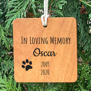 Wood ornament with laser engraved text In Loving Memory Oscar 2009 2020 and pawprint